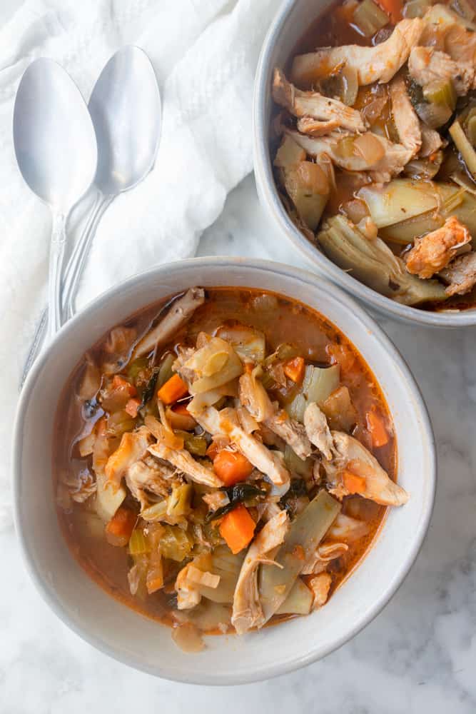 overview of two bowls of Chicken and Artichoke Stew