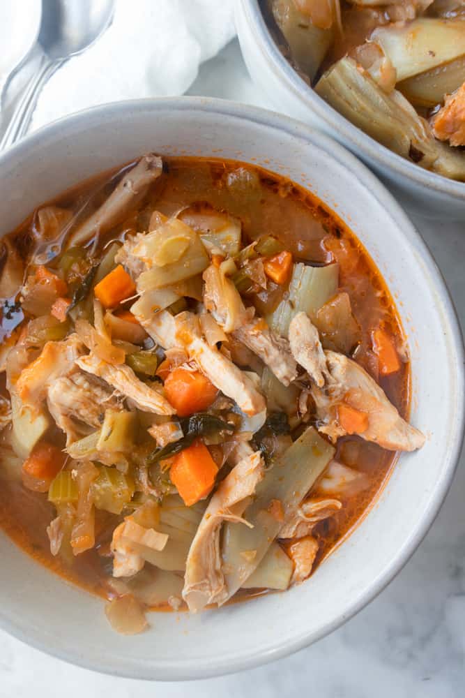 a close up of the Chicken and Artichoke Stew in a bowl