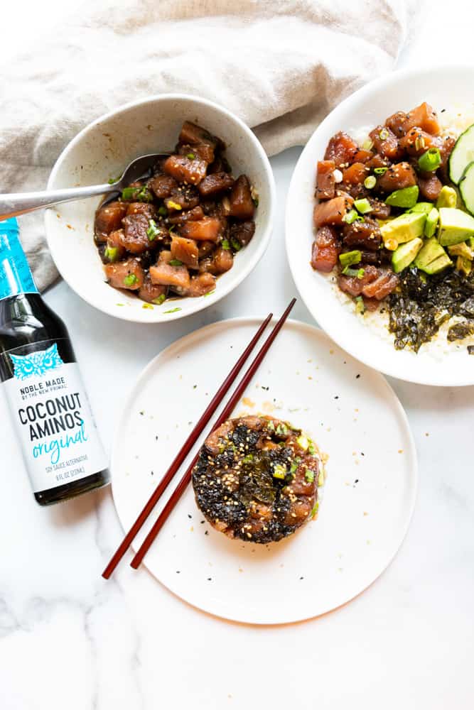 poke tuna stacks alongside a poke bowl and plain poke