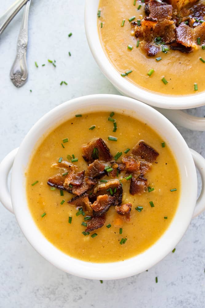 spicy potato soup with crumbled bacon on top