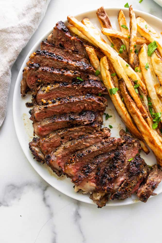 a close up of the steak frites focusing on the steak