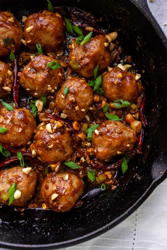 a close up of kung pao chicken meatballs