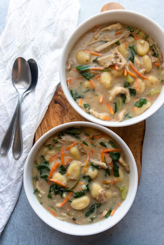 two bowls of chicken gnocchi soup