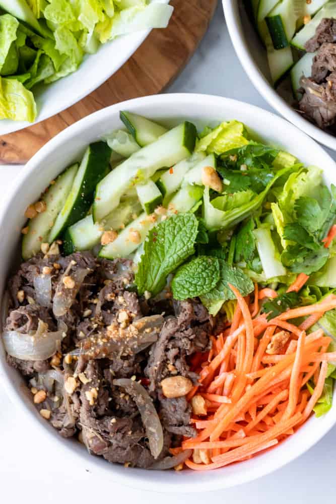 a bowl of bun bo xao (vietnamese lemongrass beef noodle)