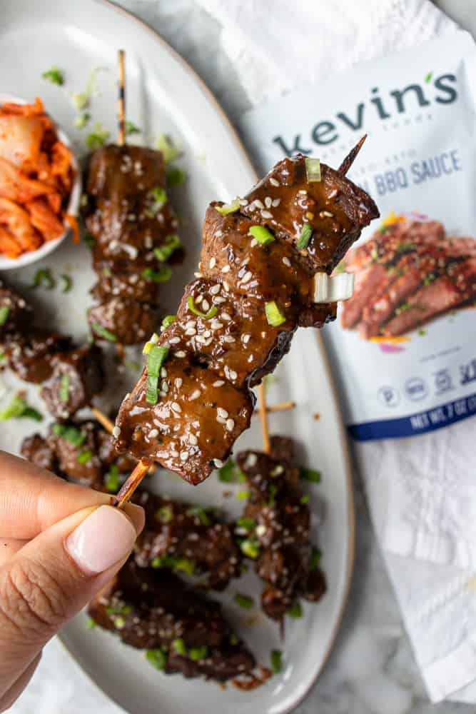 one of the Korean BBQ Skewers being held up to see a close up